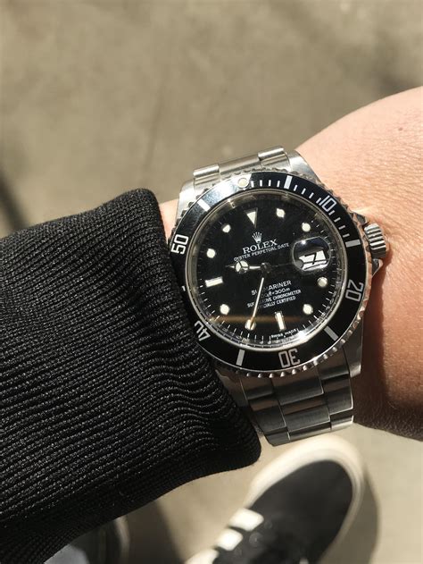 zwarte rolex submariner|Rolex Submariner wrist watch.